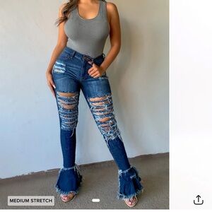 Fray what you mean flare leg jeans medium blue wash